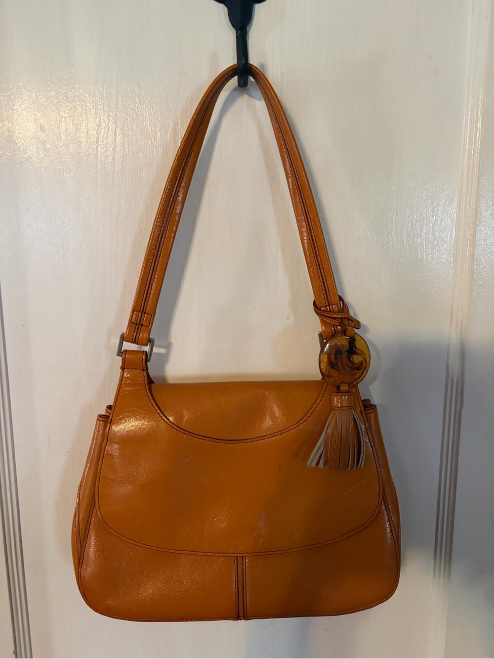 HOBO Tan Leather Shoulder Bag with Tassel Charm